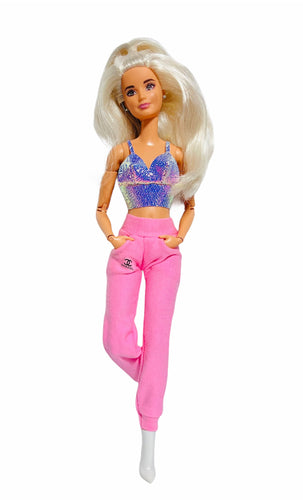 Pink sweatpants for Barbie dolls with pockets